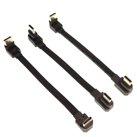 a pair of black cable connectors