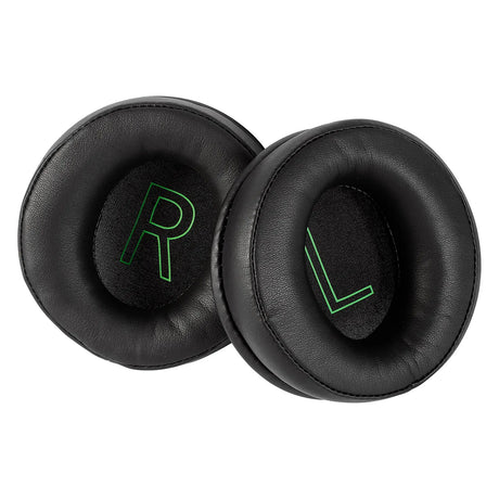 Pair of black circular ear cushions with green ’R’ and ’L’ letters visible.