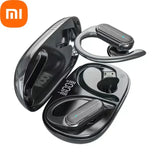 a pair of black earphones with a case on top