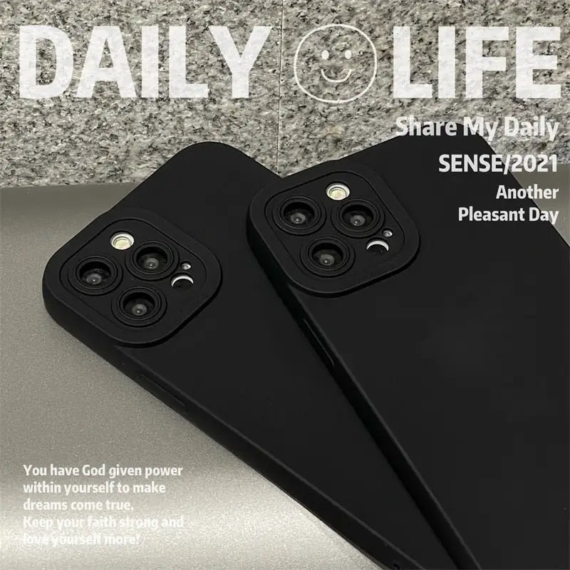 a pair of black iphone cases with the text, day of life