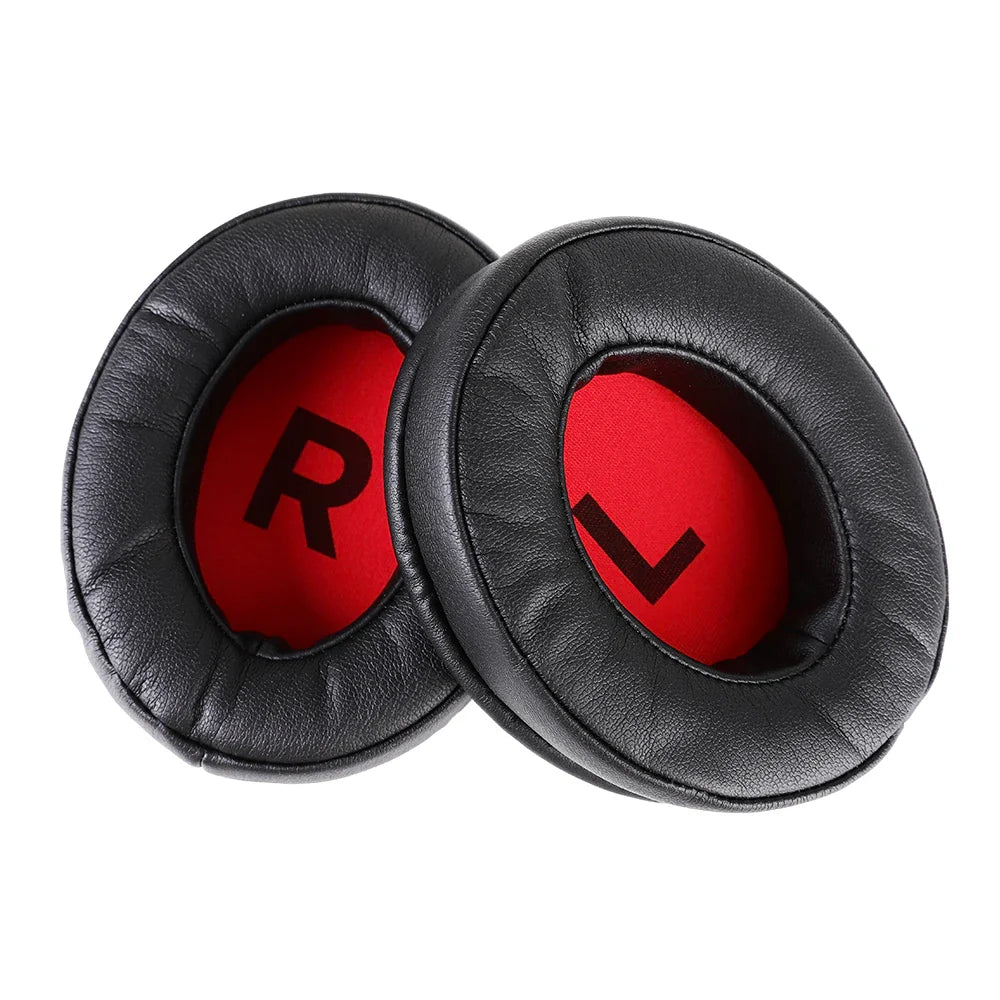 Pair of black leather ear cushions with red inner lining showing ’R’ and ’L’ letters.