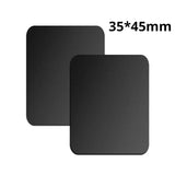 a pair of black square coasters with a white background