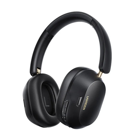 Pair of black over-ear wireless headphones with gold accents.