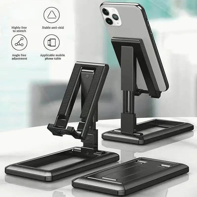 a pair of black phone stands on a white table