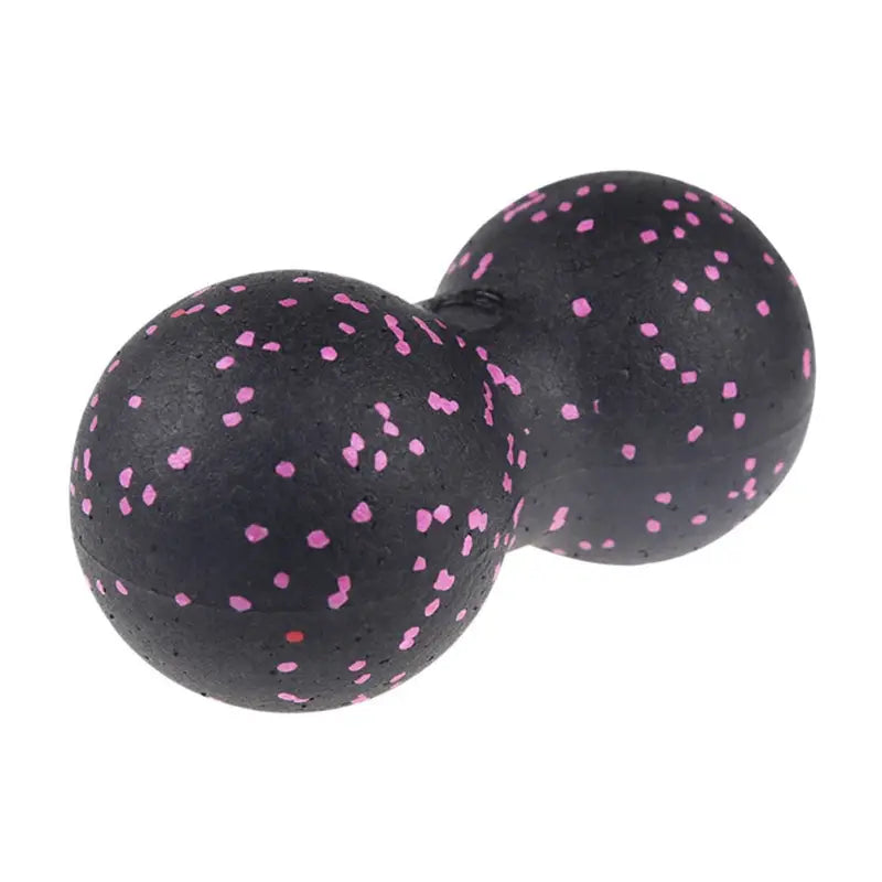 two black and pink polka doted balls
