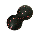 a black and red ball with pink spots