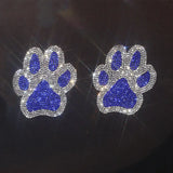 a pair of blue and white rhine dog paw earrings