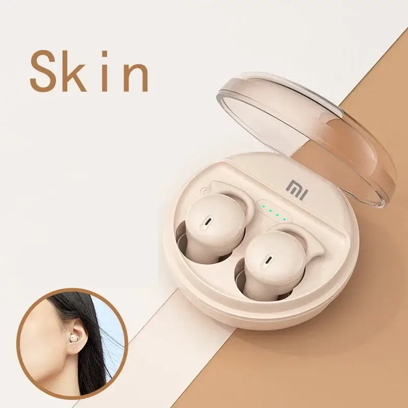 A pair of bluetooth wireless earphones with a white box