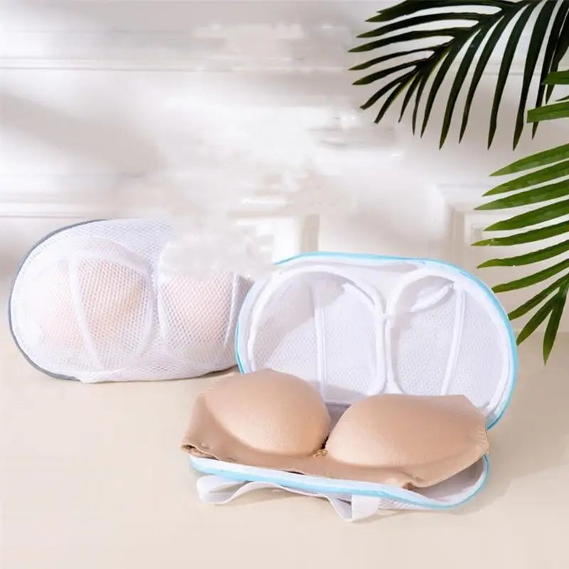 a pair of bra bras with a plant in the background