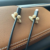 a pair of earphones sitting on top of a car dashboard