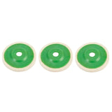 a pair of green plastic eyeballs