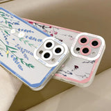 a pair of iphone cases with flowers on them