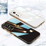 a pair of iphone cases on a marble surface