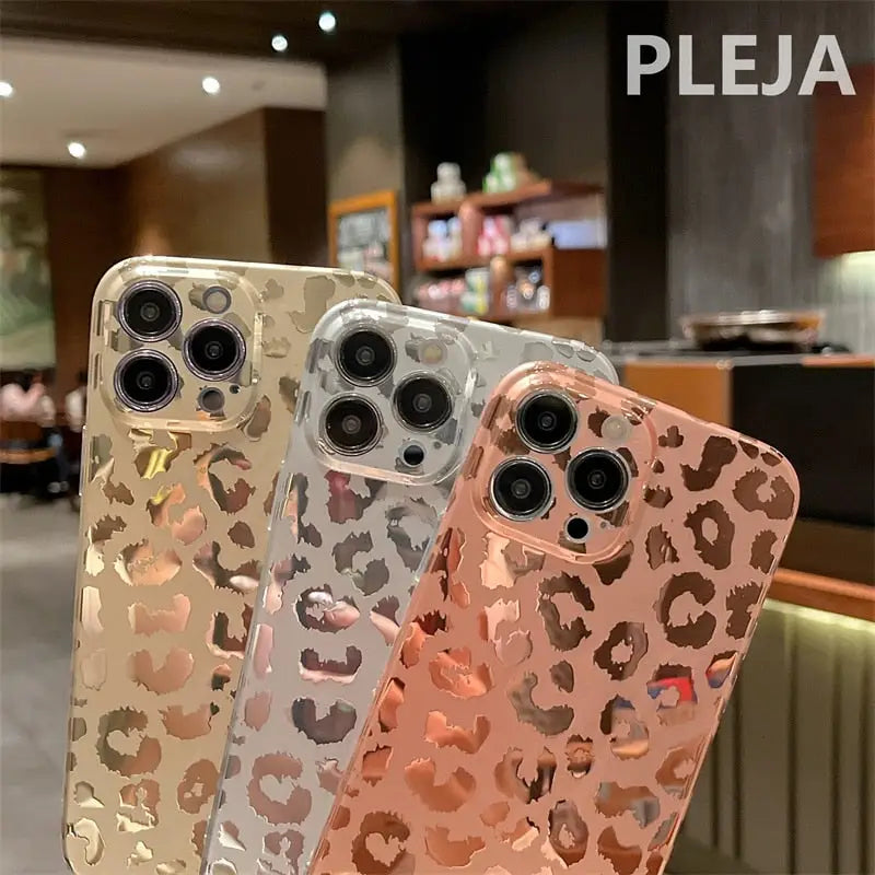 a pair of iphone cases with a leopard print