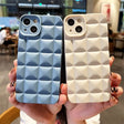 a pair of iphone cases with a white and blue design