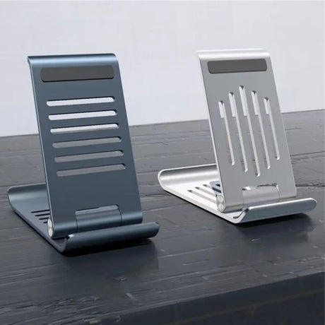 a pair of metal desk stands on a table
