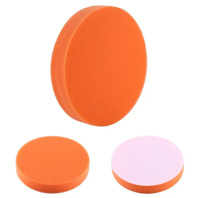a pair of orange foam pads