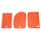 a pair of orange plastic blades