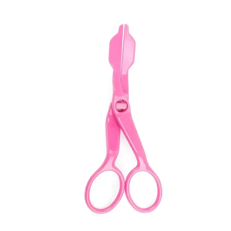 a pair of pink scissors on a white background