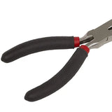 a pair of pliers with red handles