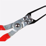 a pair of pliers with red handles