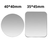 a pair of round mirrors with a white background