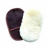 a pair of sheepskins with a white and maroon color