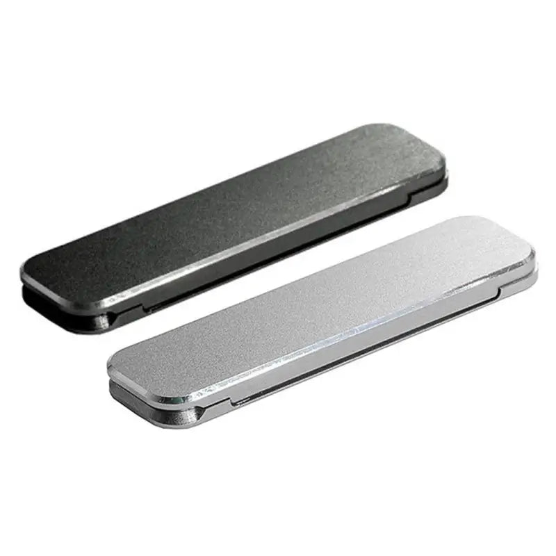 a pair of silver and black metal money clip