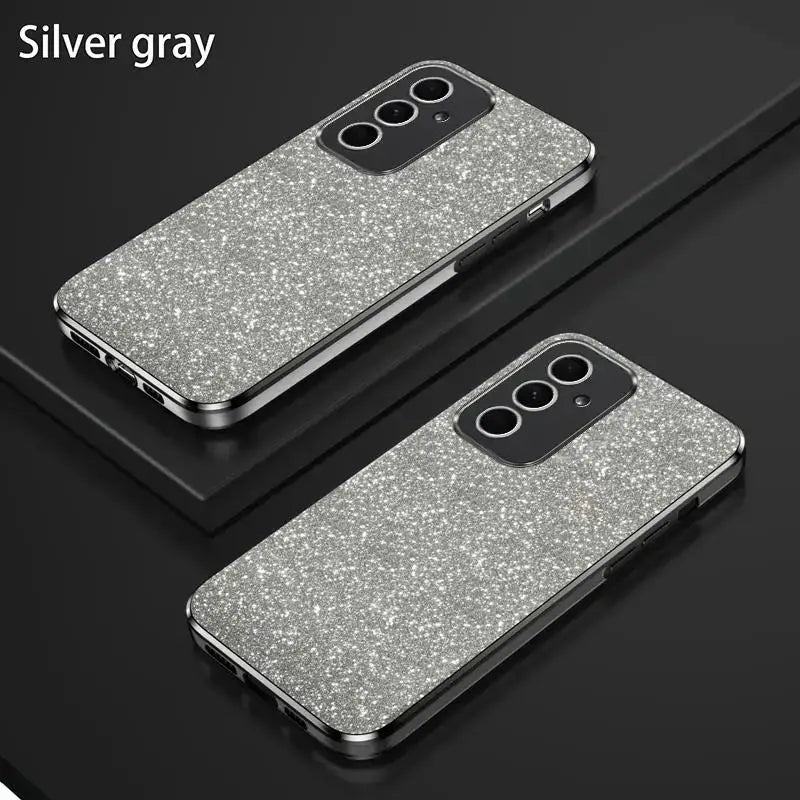 a pair of silver glitter cases on a black surface