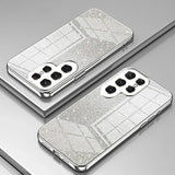 a pair of silver glitter phone cases