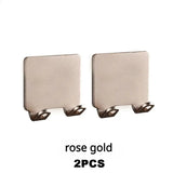 a pair of square metal earrings with a square shape