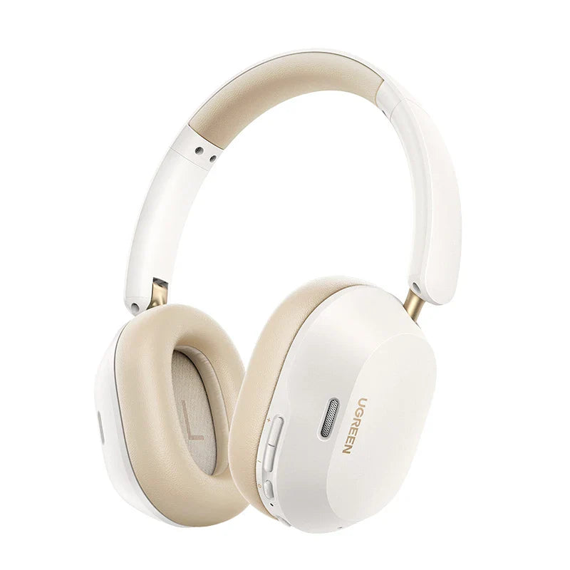 Pair of white and beige over-ear wireless headphones.