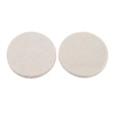 a pair of white ceramic discs