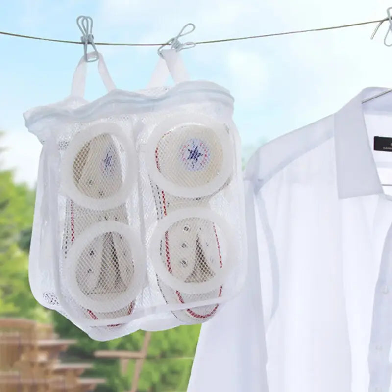 a white shirt hanging on a clothes line