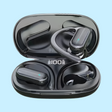 Pair of wireless earbuds with ear hooks in an open charging case.