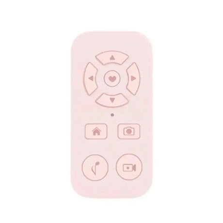 Pale pink remote control with heart-centered directional pad and function buttons.