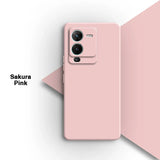 Pale pink smartphone with a prominent square camera module.