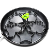 a pan with four green apples in it