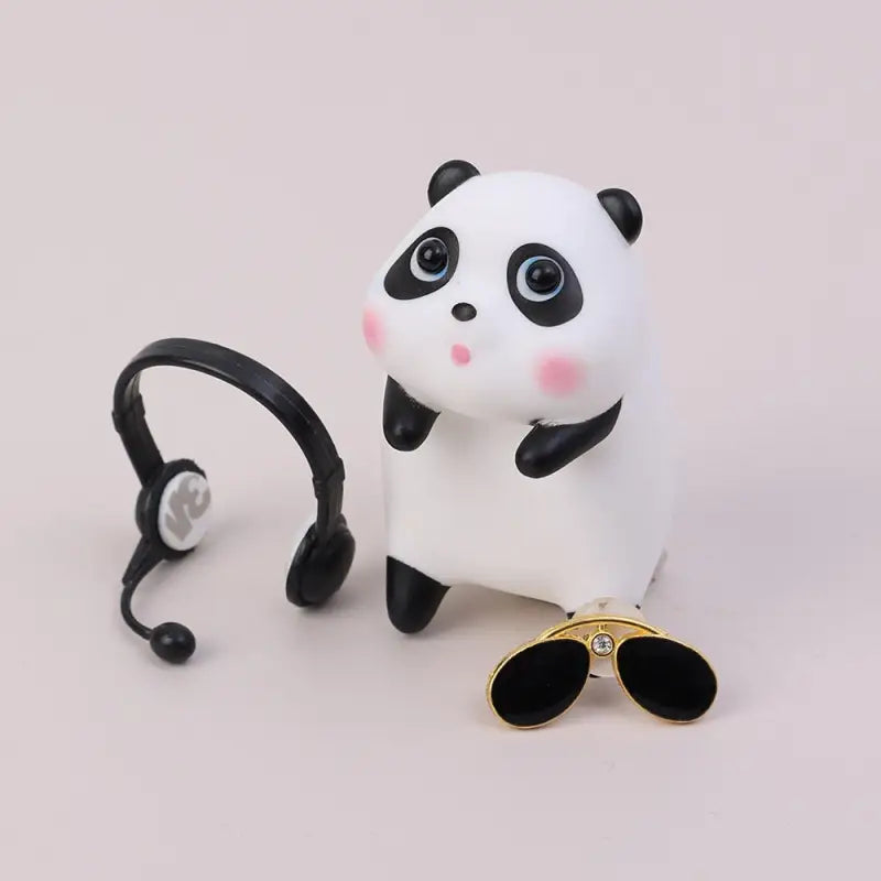 a panda bear with sunglasses and headphones