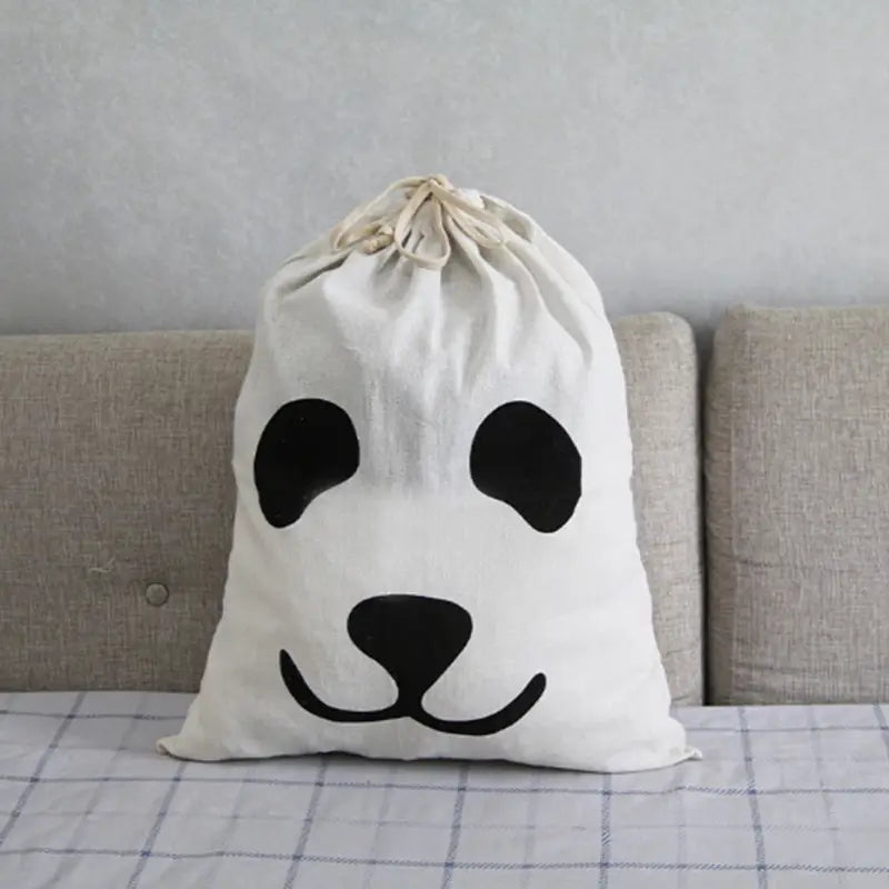 a panda face draws on a white bag