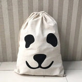 a panda face draws on a white bag