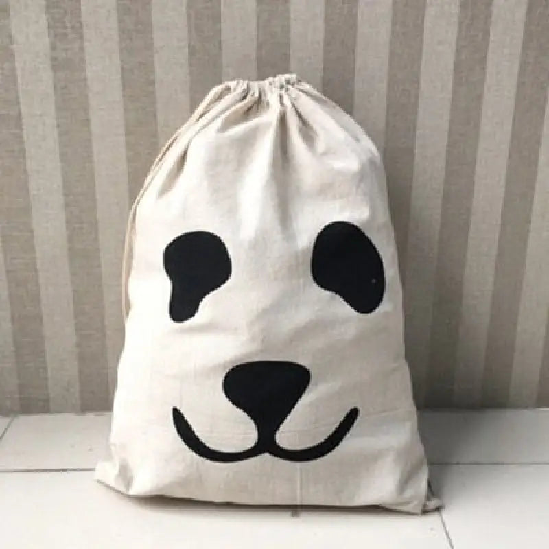 a panda face draws on a white bag