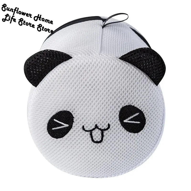 a white panda face mask with black ears