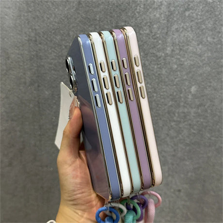Pastel-colored phone cases with gold trim.