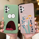 two people holding up their phone cases with cartoon faces