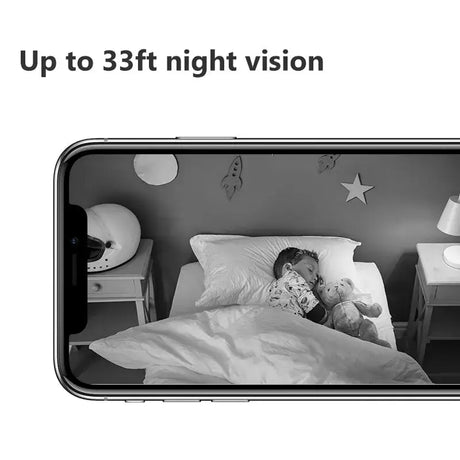 A person laying in bed with a phone