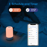 A person sleeping in bed with a smart light on the side