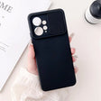 a person holding a black phone case