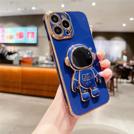 A person holding a blue phone case with a camera