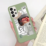 a person holding a book and a phone case